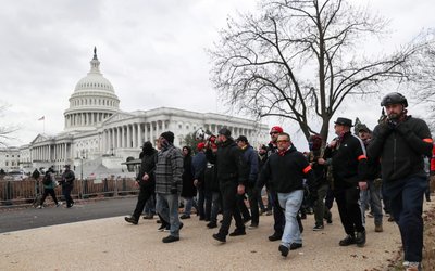 FILE PHOTO: Members of the the far-right group Proud Boys march to the U.S. Capitol Building in Washington